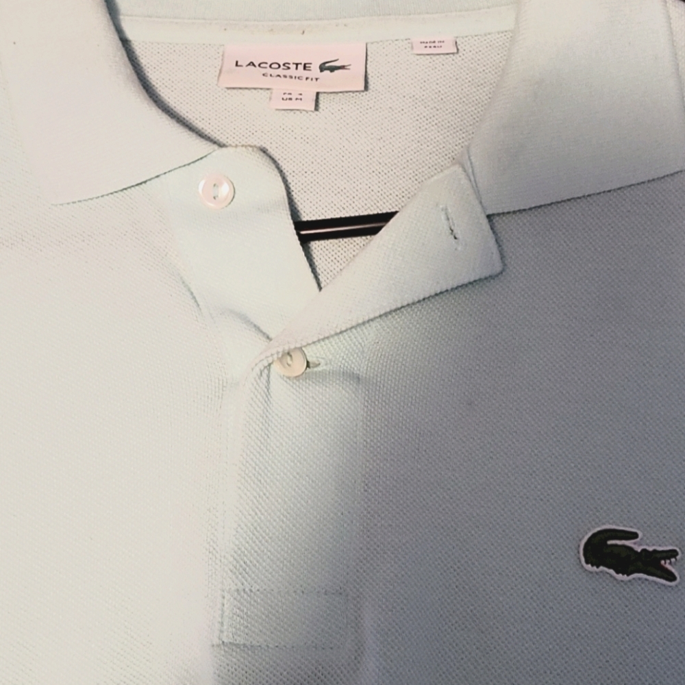 Light green pole style lacoste golf shirt